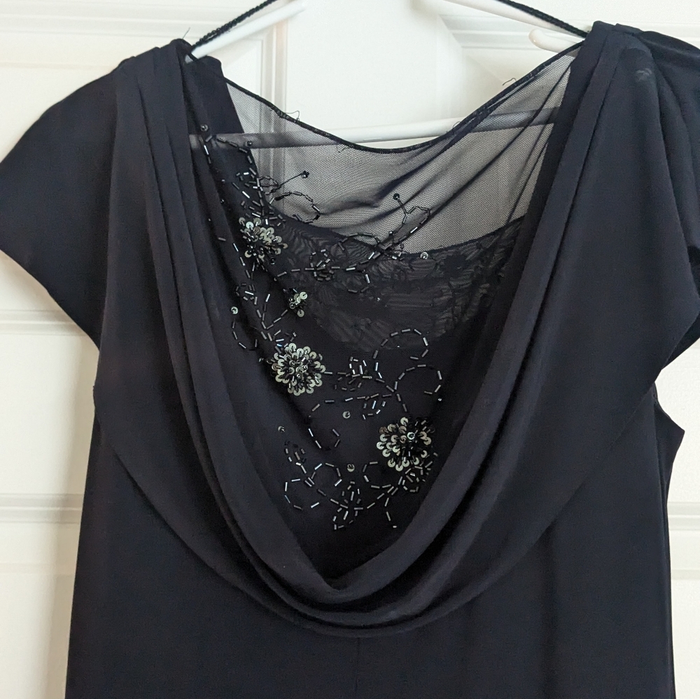 Gown for formal occassion. Shawl neck with mesh/lace bodice.